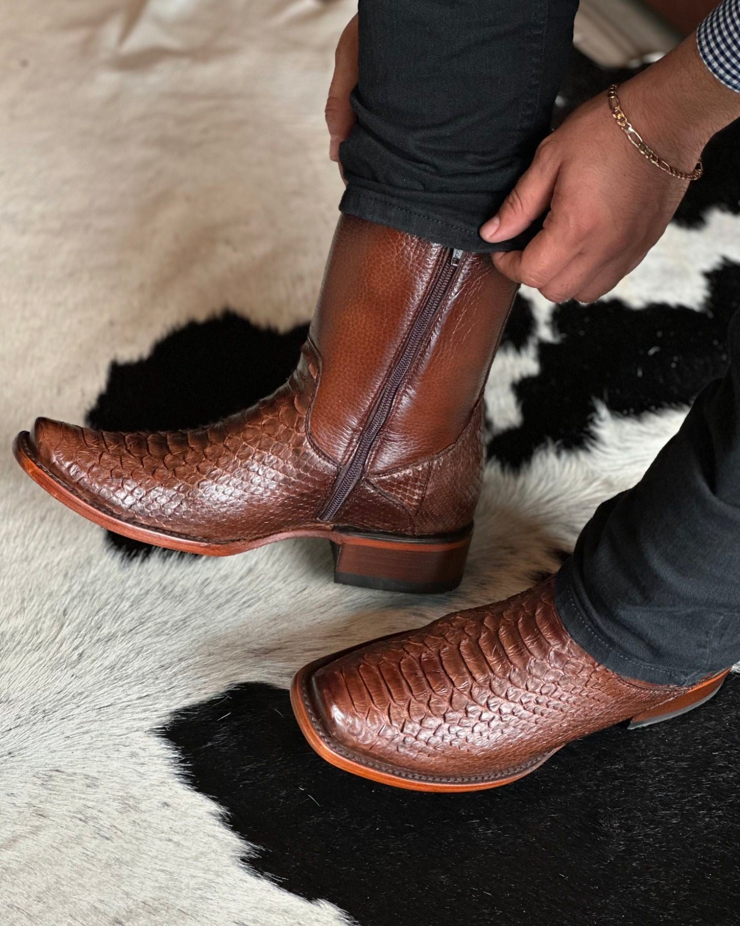 Brown and red zippered alligator leather boots
