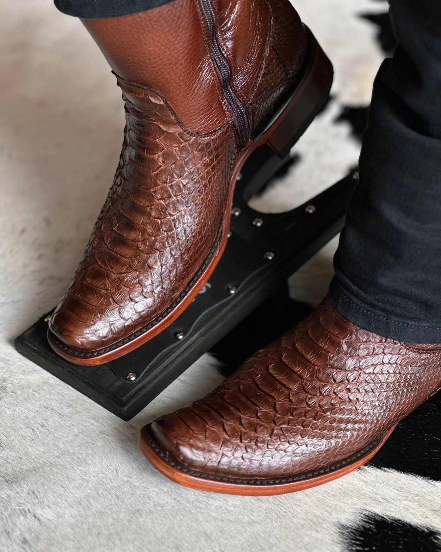 Brown and red zippered alligator leather boots