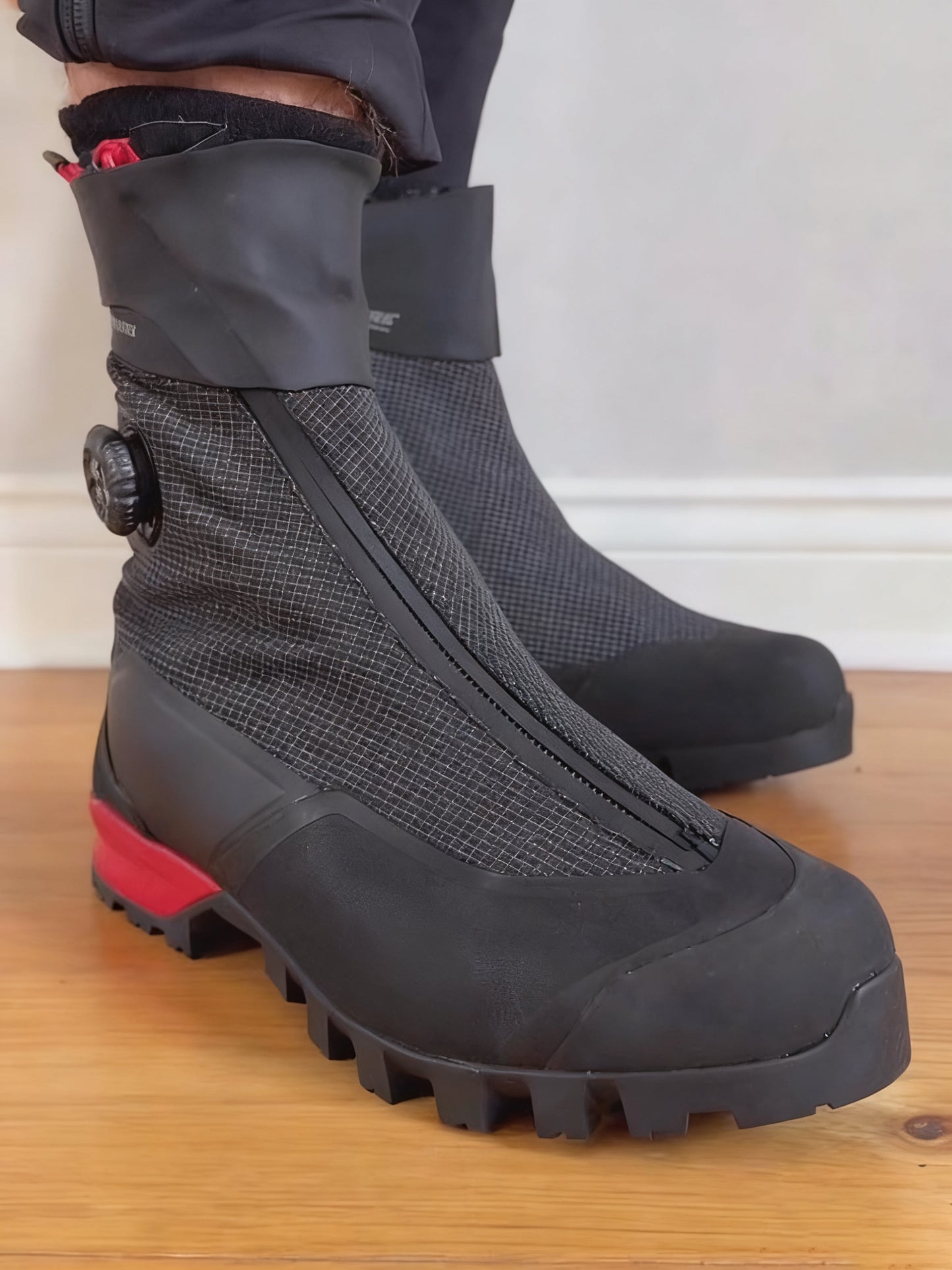 Black fleece-lined full-coverage sneakers