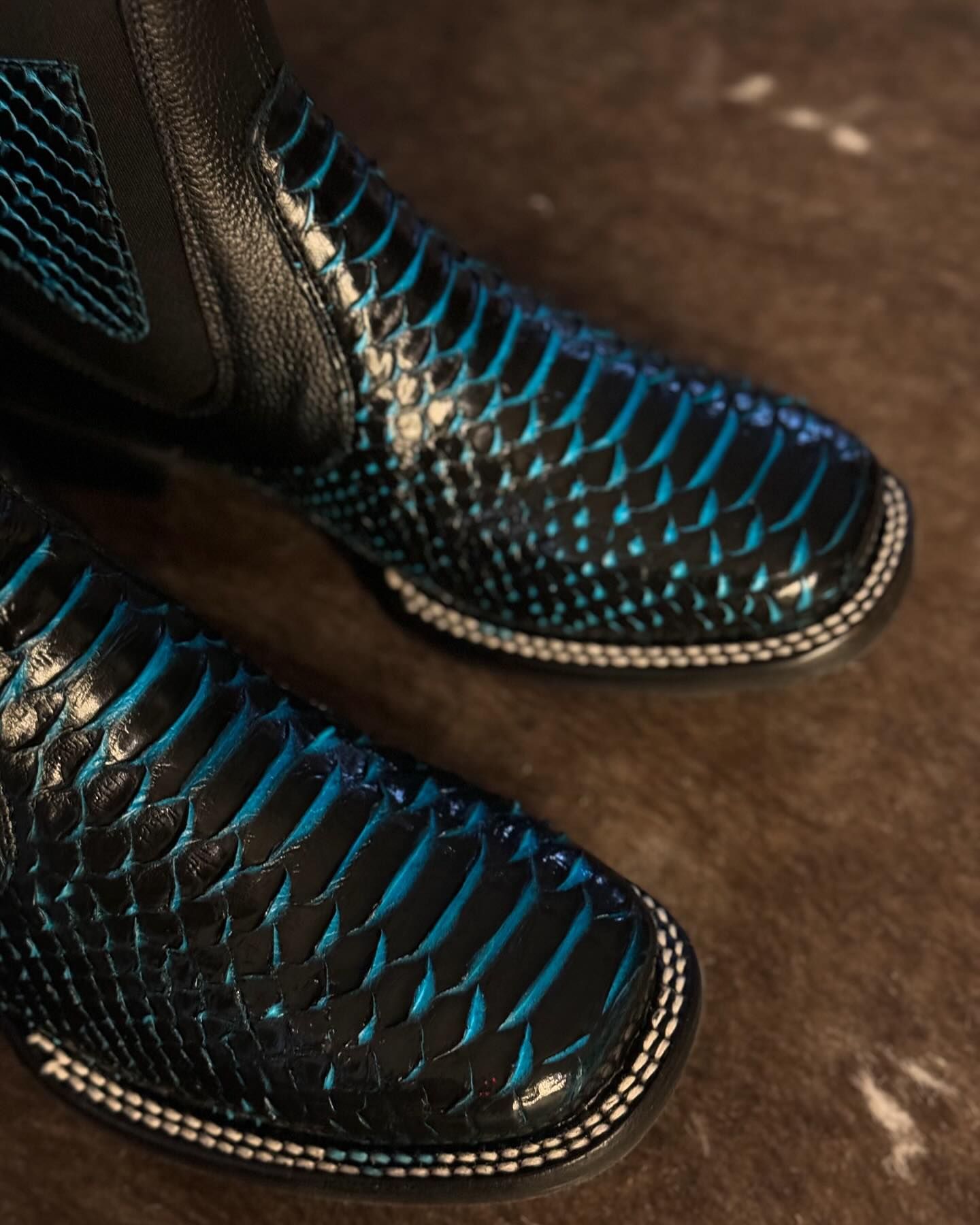 Blue crocodile leather boots