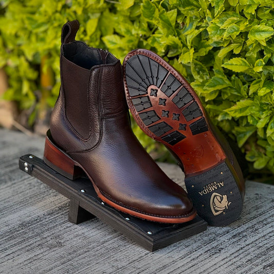 Black and brown reinforced sole casual leather boots