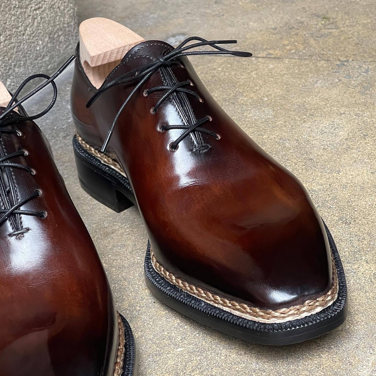 Deep brown patterned carved Italian leather shoes