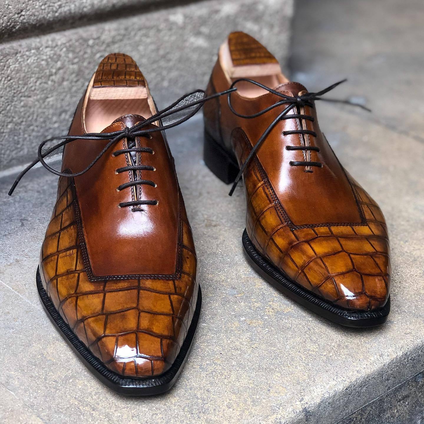 Textured brown Italian high-end leather shoes