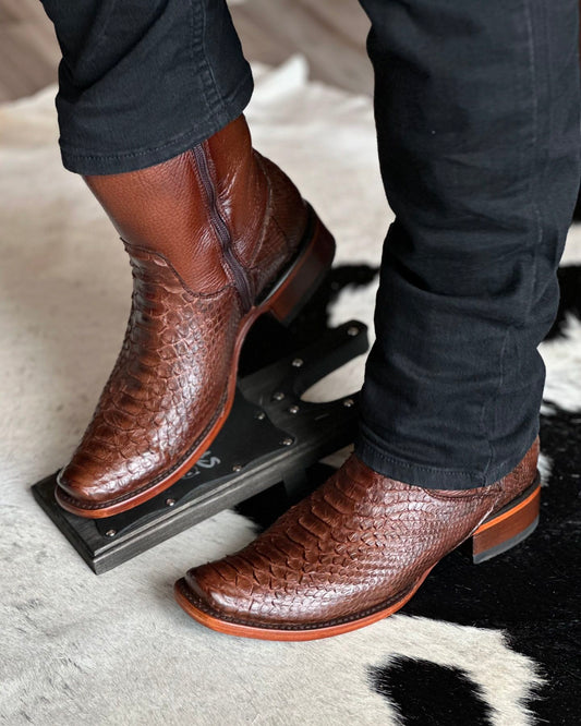 Brown and red zippered alligator leather boots