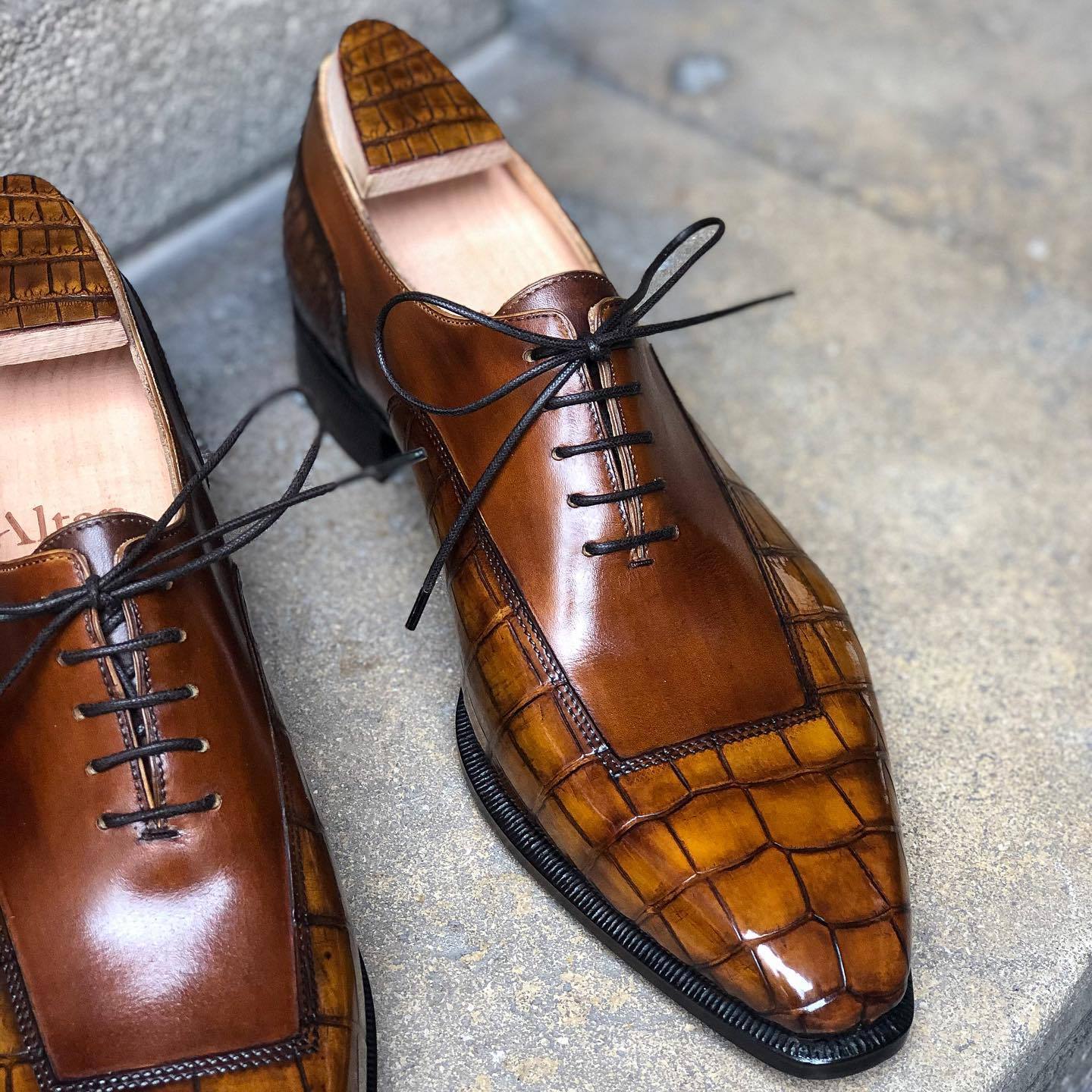 Textured brown Italian high-end leather shoes