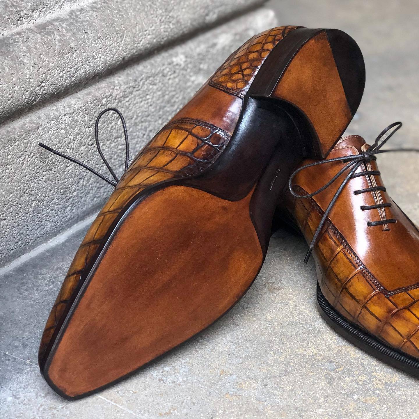 Textured brown Italian high-end leather shoes