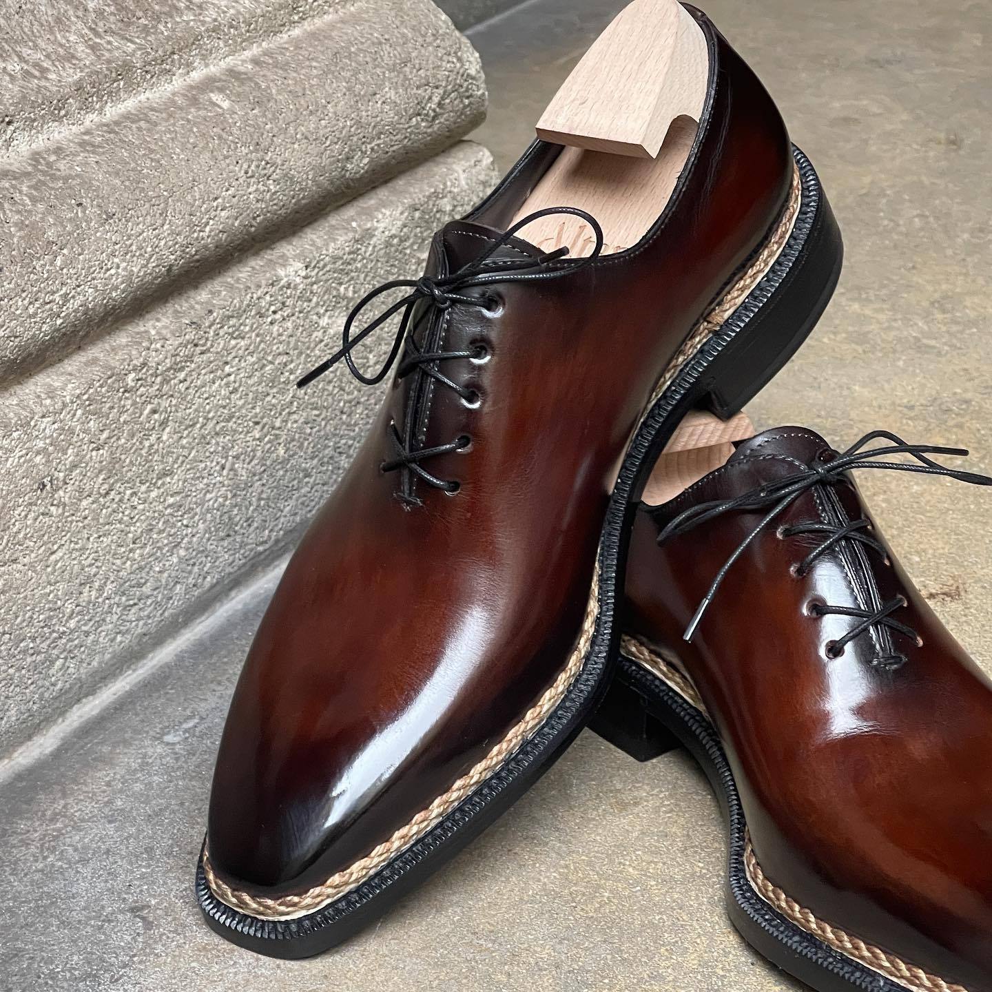 Deep brown patterned carved Italian leather shoes