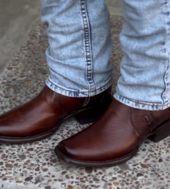 Brown red leather cowboy boots