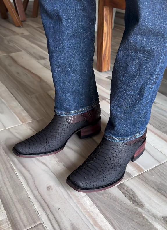 Mid-calf dark red and black cowboy boots