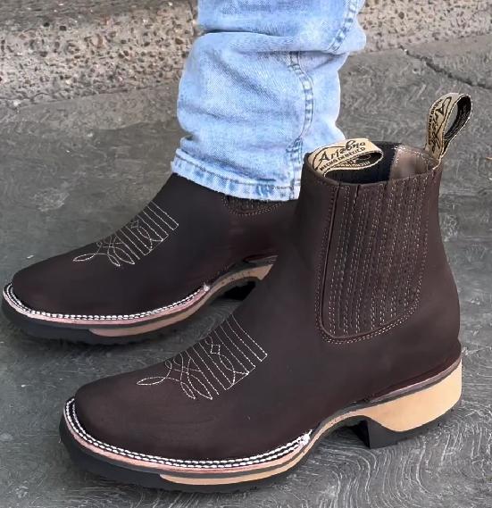 White embroidered brown denim boots